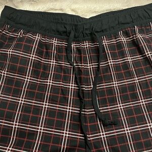 Men’s rainforest, pajamas, size medium, black, with red and white stripes.